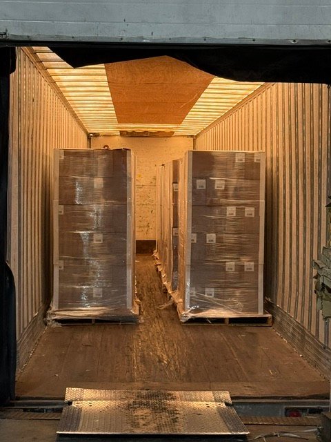 Pallets loaded into a shipping container