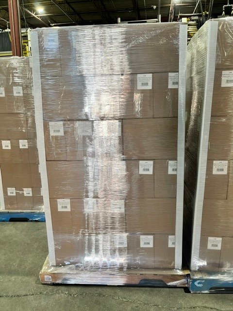 Stretch-wrapped pallets of cased product ready to ship
