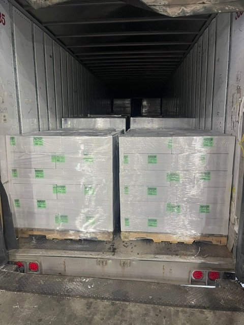 Wrapped pallets loaded into a trailer for delivery